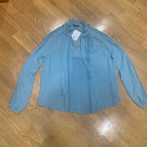 Top shop feminine blouse with a bow